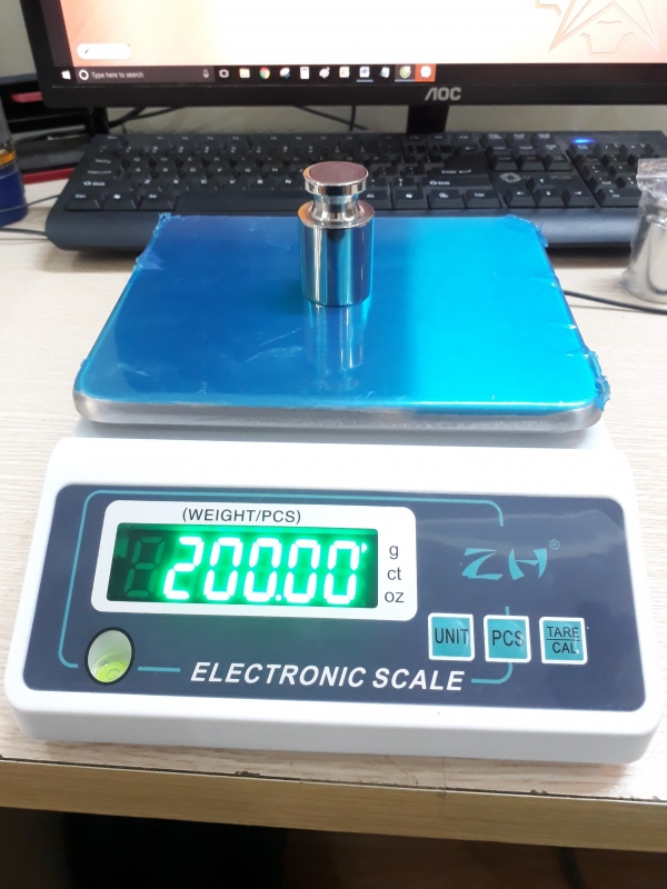 Cân điện tử 2 số JCS-11002C, max 1Kg, Trung Quốc